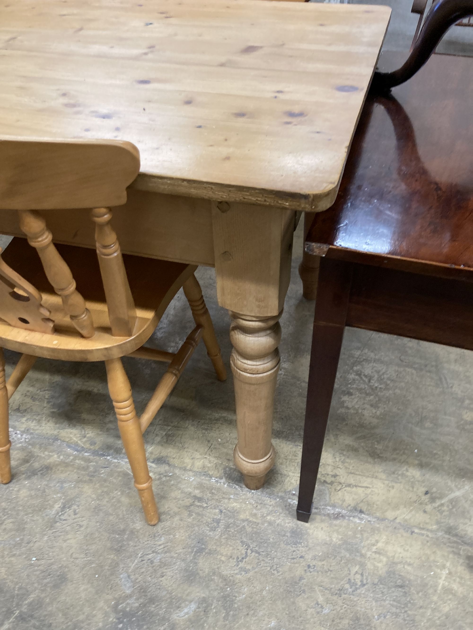 A Victorian style rectangular pine kitchen table, length 152cm, depth 90cm, height 78cm, together with four Windsor beech kitchen chairs